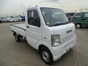 It is a picture of the white suzuki carry truck in 2007,First Photo Stock No.Y049411