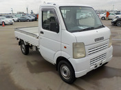 It is a picture of the white suzuki carry truck in 2003,First Photo Stock No.Y049415