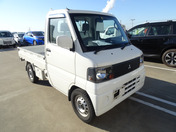 It is a picture of the white mitsubishi minicab truck in 2004,First Photo Stock No.Y049416