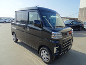 It is a picture of the black daihatsu hijet deck van in 2022,First Photo Stock No.Y049437