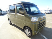It is a picture of the khaki daihatsu hijet deck van in 2022,First Photo Stock No.Y049554