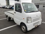 It is a picture of the white suzuki carry  truck in 2009,First Photo Stock No.Y058209