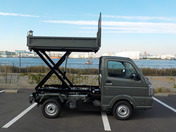 It is a picture of the ivy green suzuki carry scissors dump in 2025,First Photo Stock No.Y062268