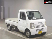 It is a picture of the white suzuki carry truck truck in 2006,First Photo Stock No.Y062879