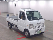 It is a picture of the white suzuki carry truck truck in 2009,First Photo Stock No.Y062900