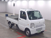 It is a picture of the white suzuki carry truck truck in 2010,First Photo Stock No.Y062901