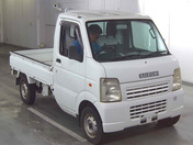 It is a picture of the white suzuki carry truck truck in 2007,First Photo Stock No.Y062915