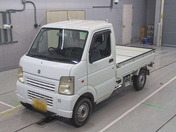 It is a picture of the white suzuki carry truck truck in 2010,First Photo Stock No.Y062978