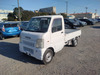 It is a picture of the white suzuki carry truck in 2002,Sub Photo 0 Stock No.Y063624