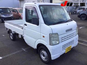 It is a picture of the white suzuki carry truck truck in 2002,First Photo Stock No.Y063624