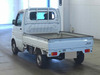 It is a picture of the white suzuki carry truck in 2010,Sub Photo 1 Stock No.Y063880